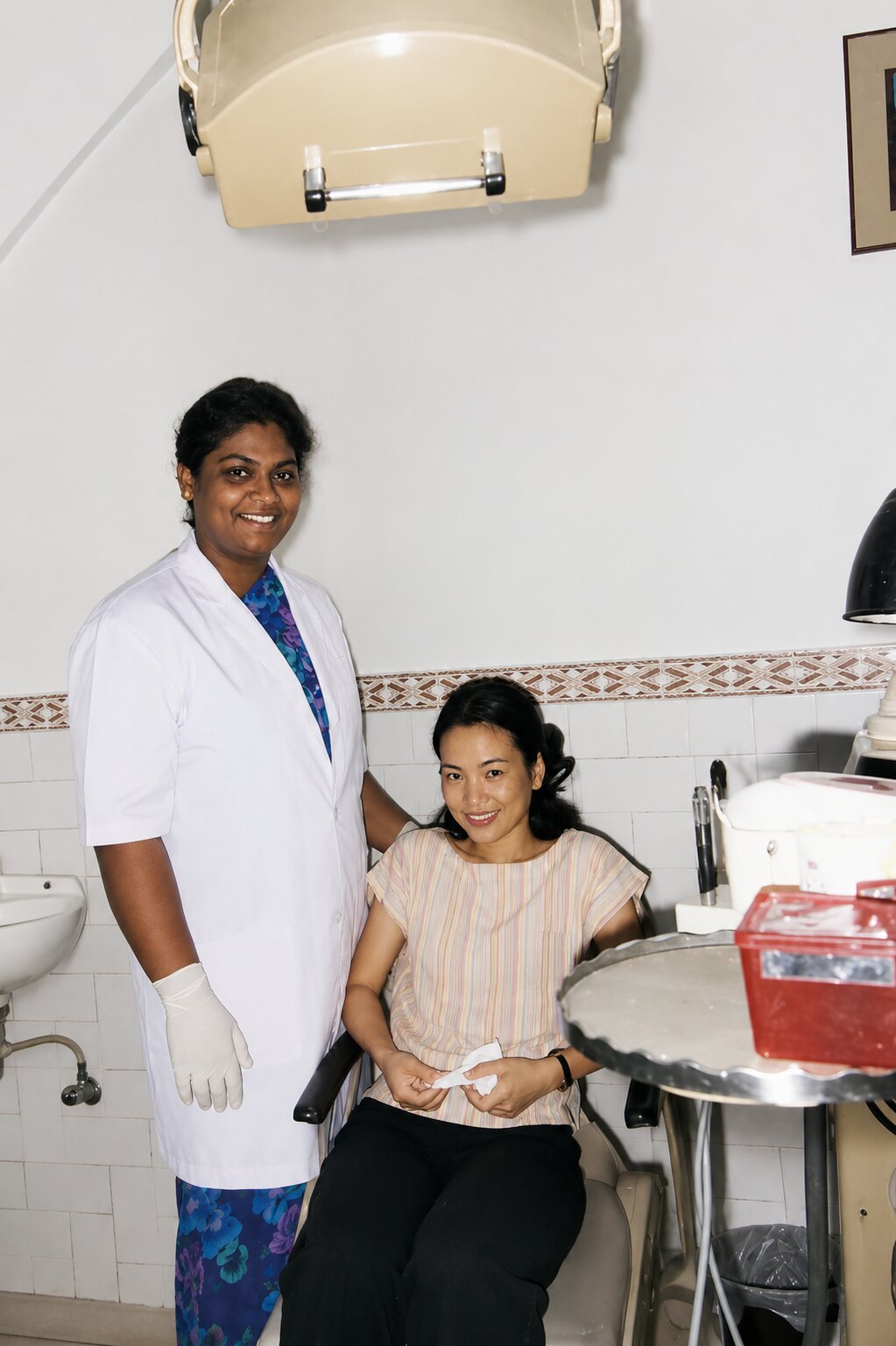 Prof. Dr. Elizabeth Joshua consulting with and treating a patient at the clinic